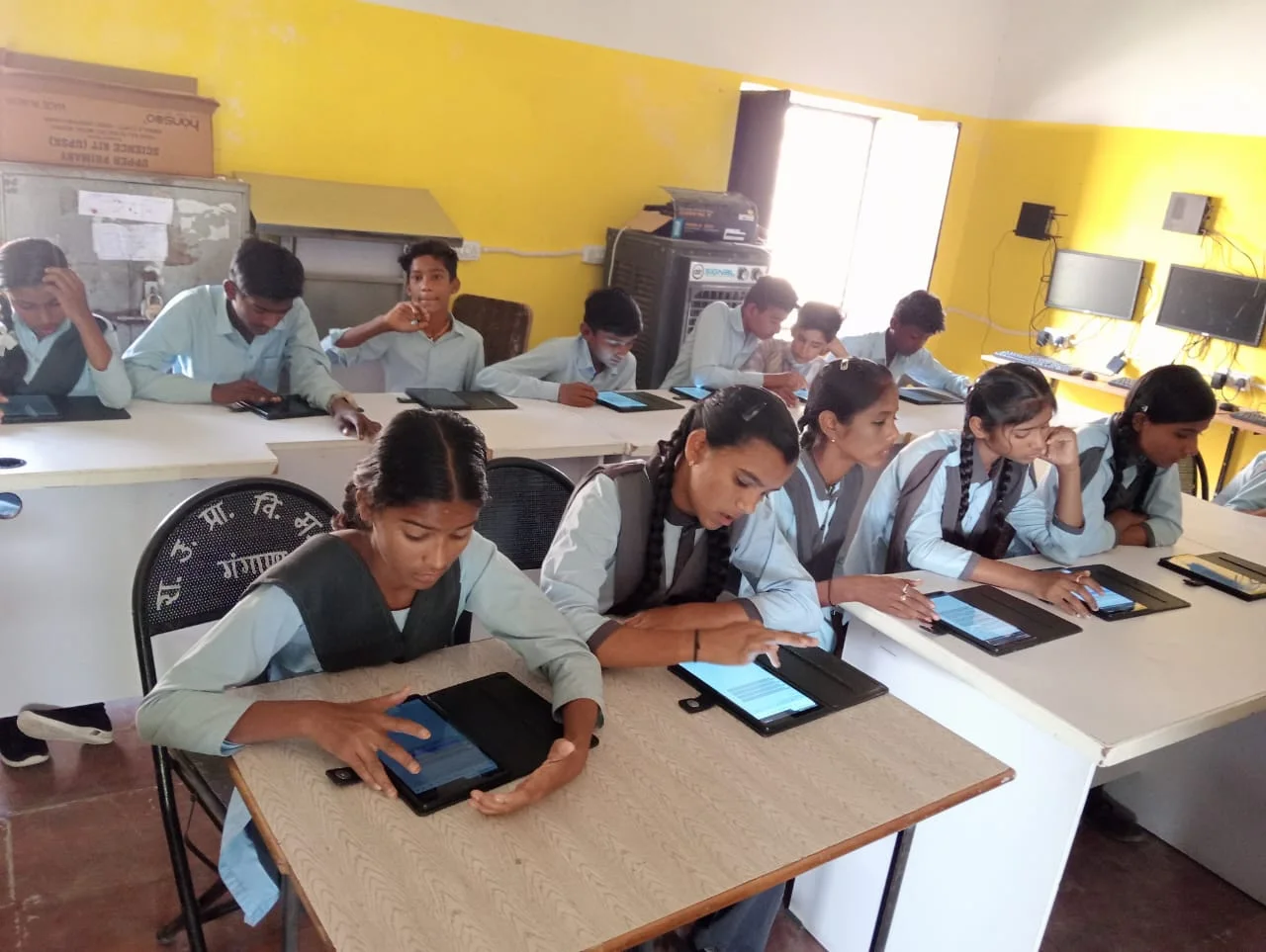 Students taking a digital assessment