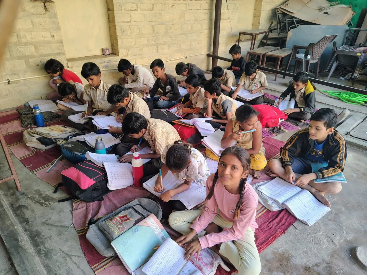 Children studying together during a Navodaya learning session