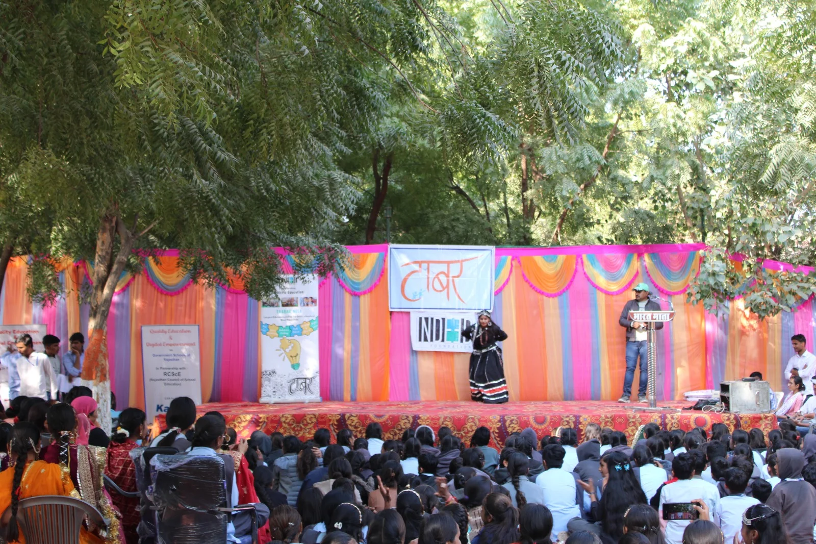 Students watching the Taabar Mela stage programme