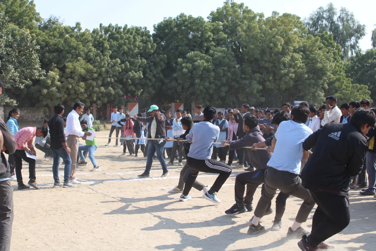 Students taking part in a tug-of-war game
